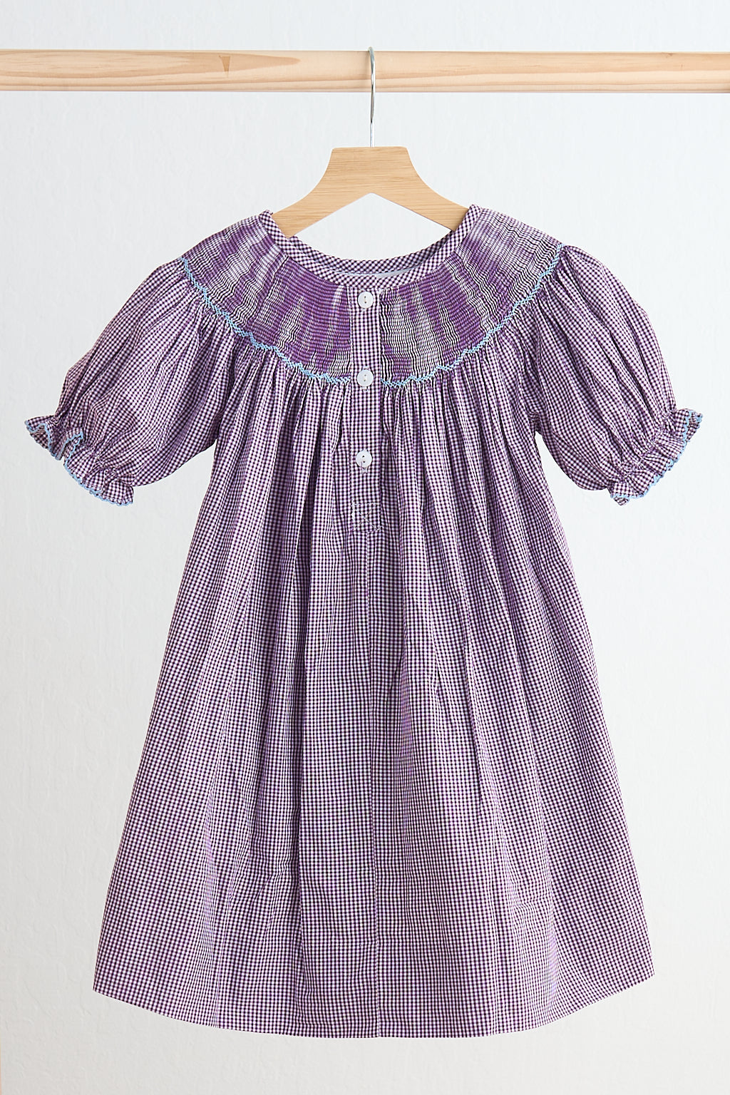 Purple castle hand smocked gingham dress